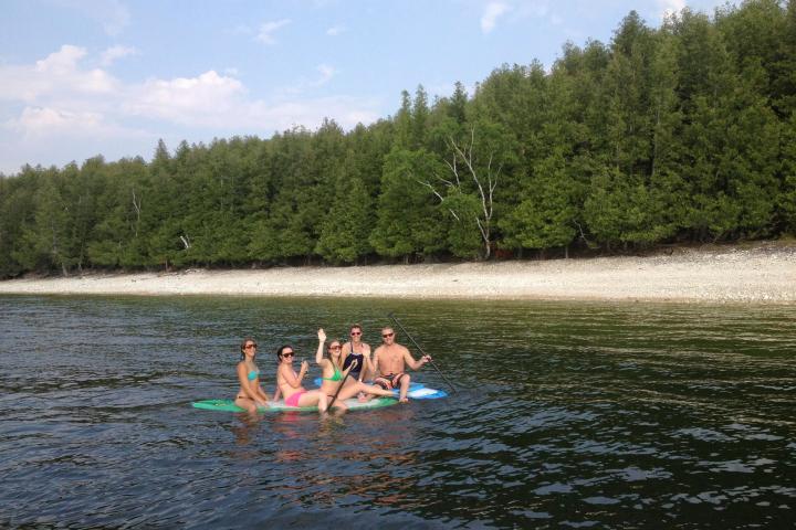A group with paddleboard rentals