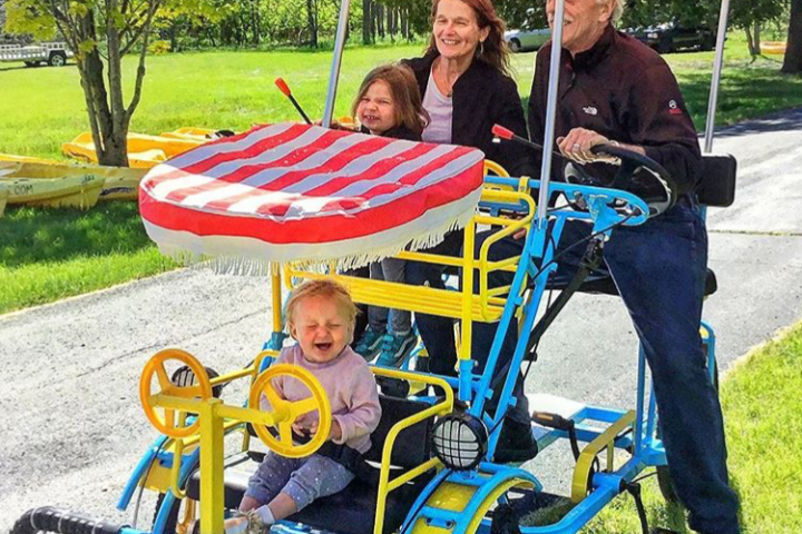 a small child holding a sign