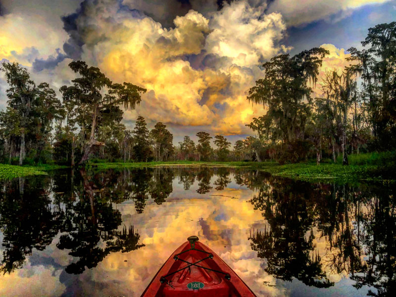 Kayak paddling through estuary in Door County, WI
