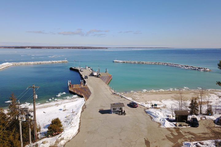A dock protrudes into a body of water