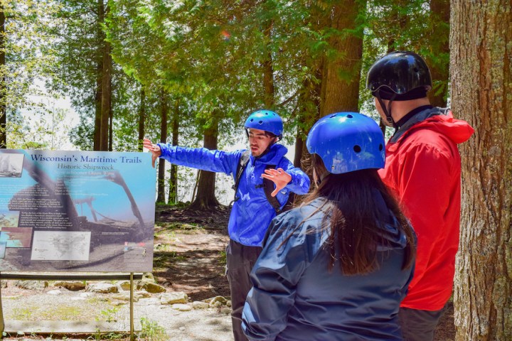 a young boy wearing a helmet